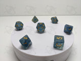 Royal Waters | 7pc Dice Set | Semi-Clear / Blue / Gold Ink | D&D and other Tabletop Games